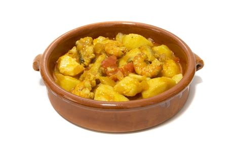 Premium Photo Potato Stew With Cod Served In A Clay Bowl Isolated