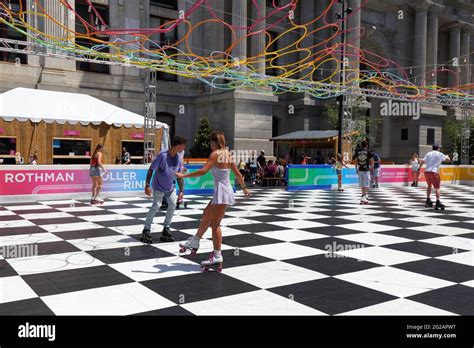 People Roller Skating At Rothman Roller Rink At Dilworth Park