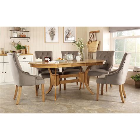 Townhouse Oval Oak Extending Dining Table With 6 Duke Grey Velvet Chairs By Furniture And Choice