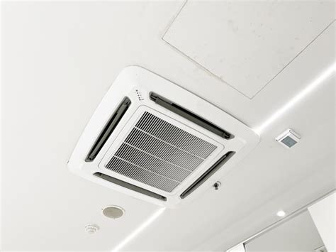 Premium Photo Ceiling Mounted Cassette Type Air Conditioner And