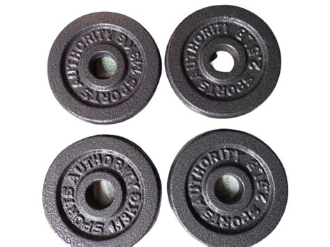 Sports Authority Dumbell Barbell Plates 25 Lbsx 4pes And 15lbsx2pes