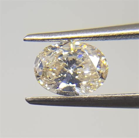 1 Pcs Diamant 0 57 Ct Oval H VVS2 Catawiki