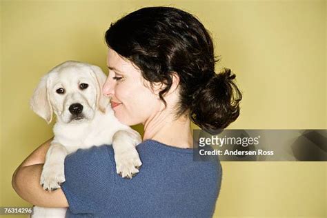 370 Dog Knotted In Woman Stock Photos High Res Pictures And Images