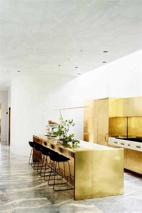 A Former Warehouse With A Bold Gold Kitchen Gold Kitchen Modern