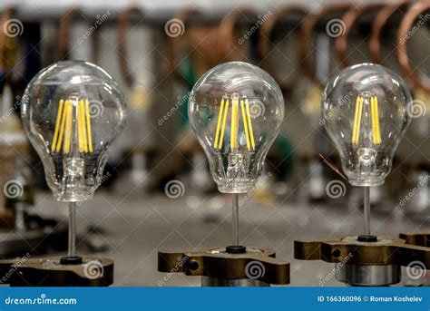 Lamp Production At The Factory Manufacturing Process Stock Photo