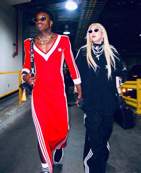 Madonna’s Son David Banda Wears Sporty Red Dress During Night Out With Mom