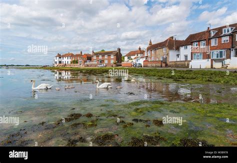 View At Low Tide Of The Small Village Of Bosham Near Chichester At