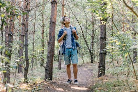 Young Traveler Guy Hiking with Backpack in the Nature Stock Image ...