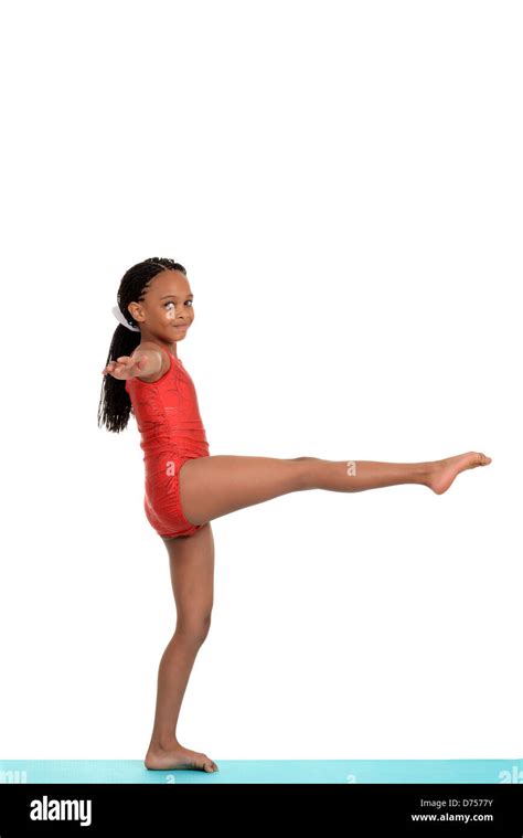 Young girl doing gymnastics balance move Stock Photo - Alamy