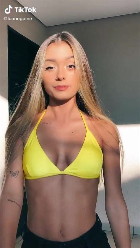 Luane Guiné Looks Erotic in Yellow Bikini Top sexyfilter