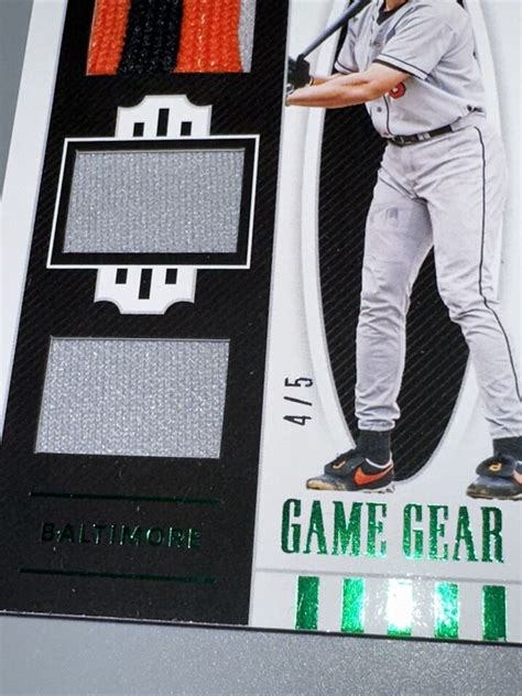 National Treasures Game Gear Materials Triples Green Cal Ripken