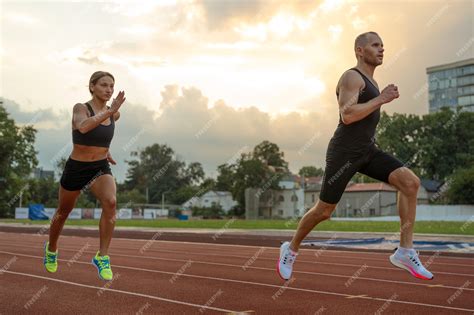 Premium Photo Side View Man And Woman Running On Track