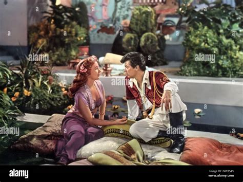 A Portrait Of Piper Laurie And Tony Curtis Starring In Son Of Ali