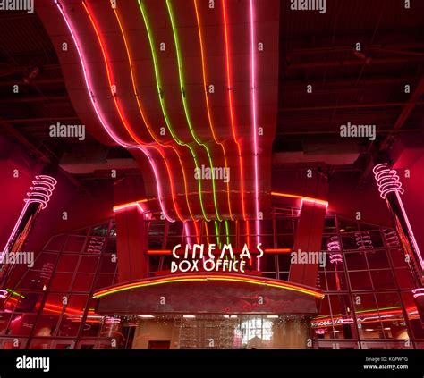 Bright neon lights of retro style movie theater Stock Photo - Alamy