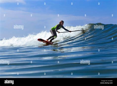 Female Swimsuit Surfer Hi Res Stock Photography And Images Alamy