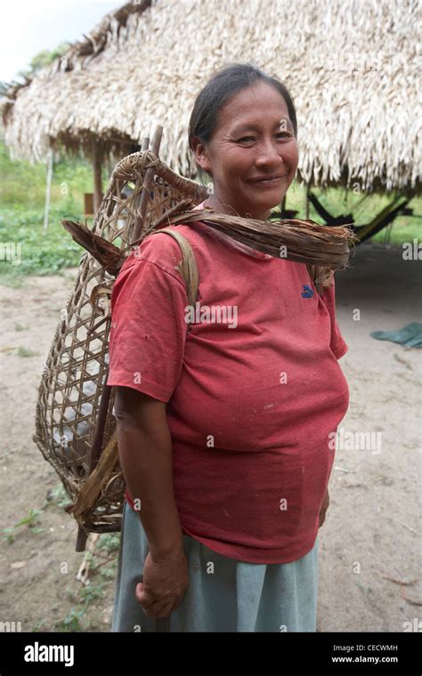 Amerindian woman with a traditional woven carrying basket, Rewa ...