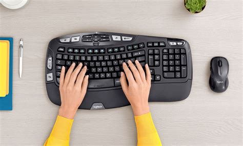 Microsoft Sculpt vs Logitech K350: which is the better ergonomic keyboard? | T3