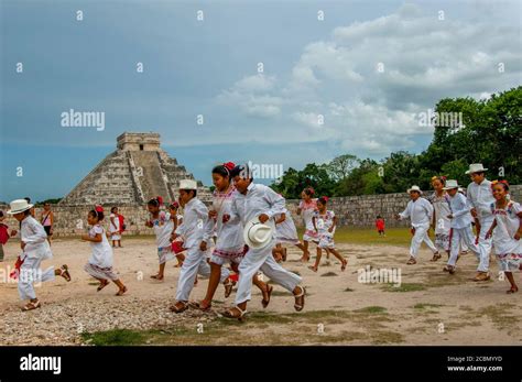 A Group Of Mayan Children Dance Group Running Through The Great Ball