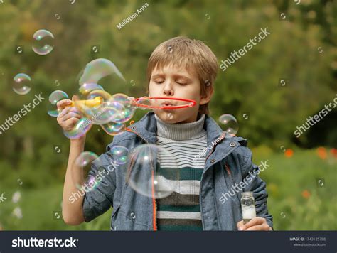 Little Cute Boy Inflates Soap Bubbles Foto Stok 1743135788 Shutterstock