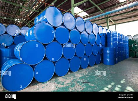 Oil Barrels Blue Or Chemical Drums Horizontal Stacked Up Stock Photo