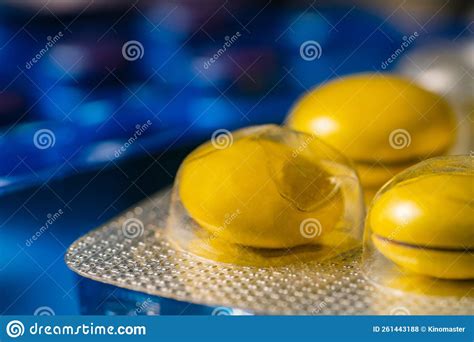 Heap Of Different Pills In Blisters Pack Close Up Of Green Yellow