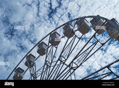 Ferris Wheel At A Funfair Stock Photo Alamy