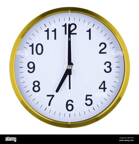 Wall Clock Isolated On White Background Seven Oclock Stock Photo Alamy