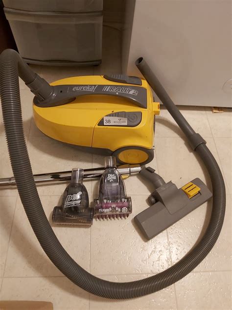 Eureka Rally 2 Vacuum With Attachments - Beck Auctions Inc.