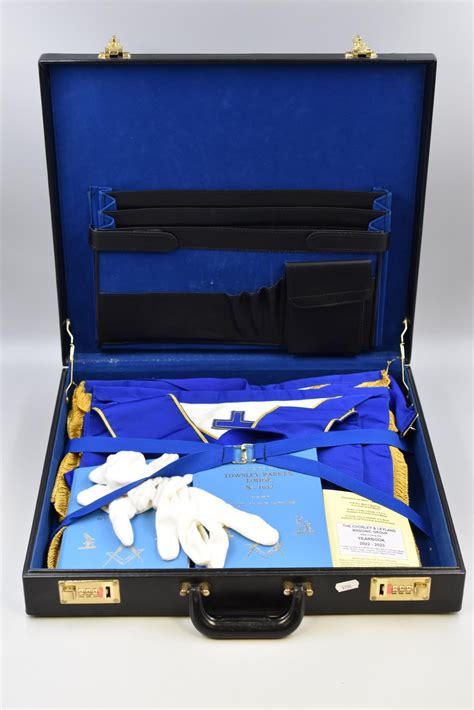 Briefcase Containing A Selection Of Masonic Regalia Including Aprons