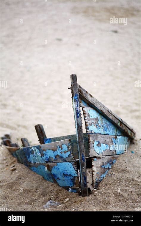 Color Picture Of An Abandoned Boat Stuck In Sand Stock Photo Alamy