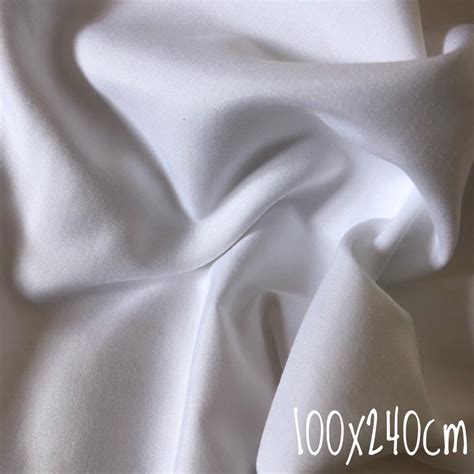 Jual Kain Bahan Sprei Meteran Kain MIcrotex Warna Putih Polos