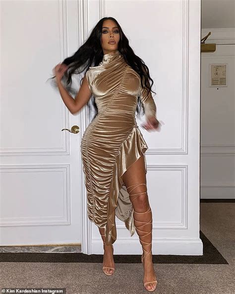 Kim Kardashian Embraces Her Curves Wearing A Gold Velvet Dress With