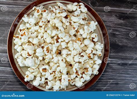 A Plate Of Popcorn And Also Called Popped Corn Popcorns Or Pop Corn