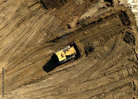 Bulldozer At Mine Reclamation Once Mining Sand Is Completed Land