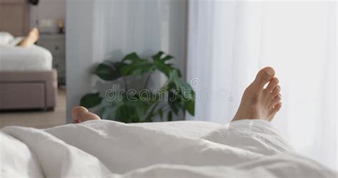 Unrecognizable Male Hands Using Mill Machine For Sugarcane Processing