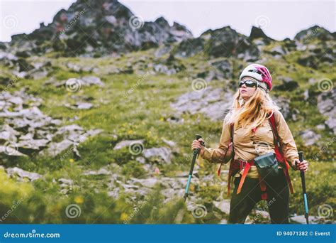 Woman Adventurer Hiking At Rocky Mountains Stock Photo Image Of