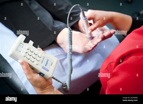 Foot Pulse Test In Diabetic Patient Nurse Using A Portable Doppler