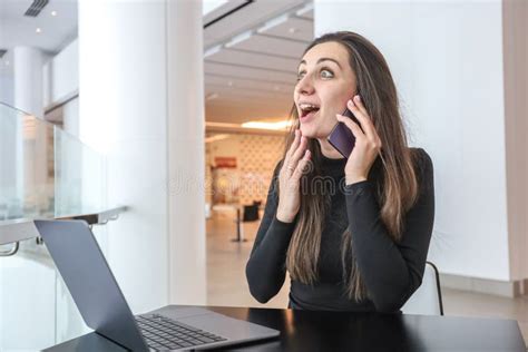 Beautiful Business Woman In Business Center Using Tablet Computer