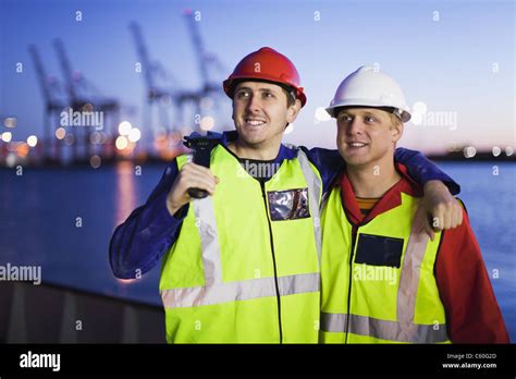 Workers Standing Together In Shipyard Stock Photo Alamy