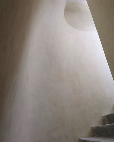 The Stairs Are Made Of Concrete And Have Been Painted White