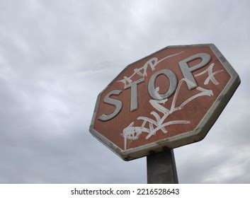 Stop Sign Painted Graffiti On Cloudy Stock Photo 2216528643 | Shutterstock