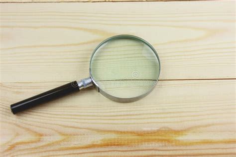 Magnifying Glass On A Wooden Table Stock Image Image Of Space Business 161640153