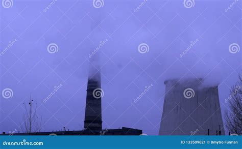 Atmospheric Air Pollution From Industrial Smoke And Dioxide Pipes