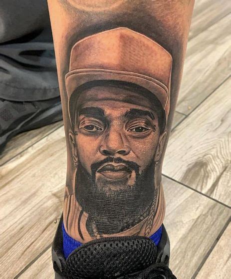 Best Nipsey Hussle Tattoos And Tattoo Ideas Nsf Music Magazine