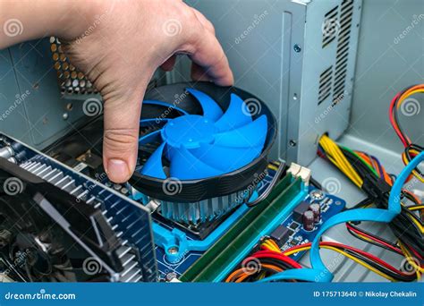 Computer Wizard Changes The Cooling System Of The Processor On The