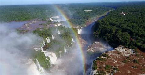 A breathtaking bird's-eye view of Iguazu Falls, adorned with numerous ...