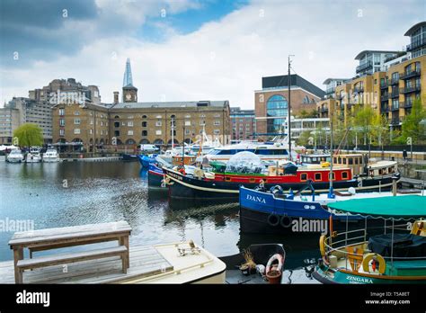 Boats And Houseboats Moored In St Katherine Dock St Katherines Dock In