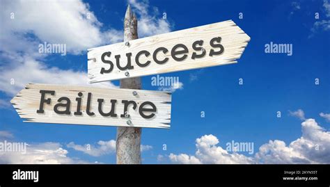 Success And Failure Wooden Signpost With Two Arrows Stock Photo Alamy