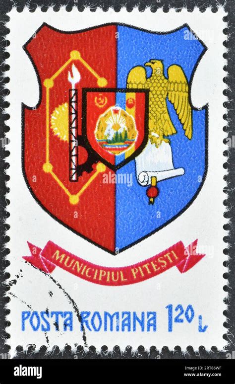 Cancelled Postage Stamp Printed By Romania That Shows Coat Of Arms Of