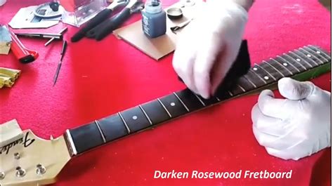 darken rosewood fretboard  step  step guide  guitarists
